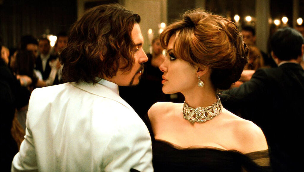 The Tourist — Florian Henckel von Donnersmarck Angelina Jolie and Johnny Depp in The Tourist movie. Romance, drama, and suspense.
