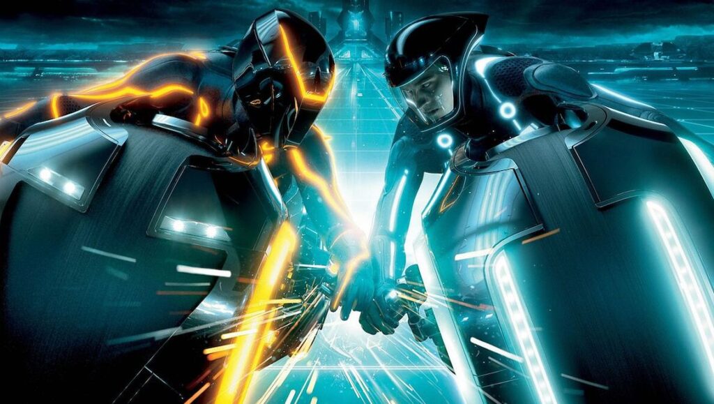 TRON: Legacy — Joseph Kosinski Tron Legacy: Light Cycle battle. Two racers face off with glowing bikes. Sci-fi action.