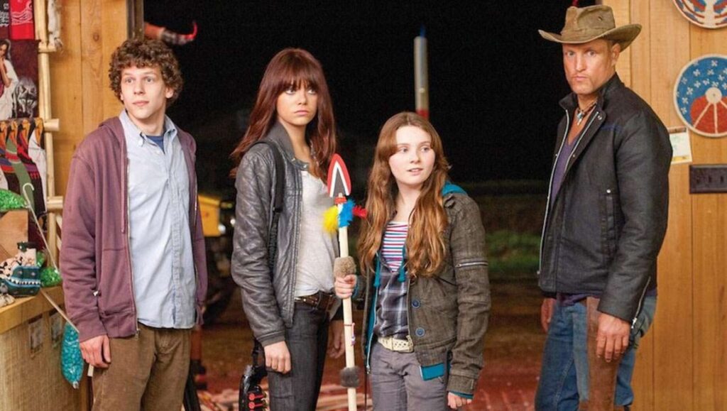 Cast of Zombieland: Jesse Eisenberg, Emma Stone, Abigail Breslin, and Woody Harrelson.