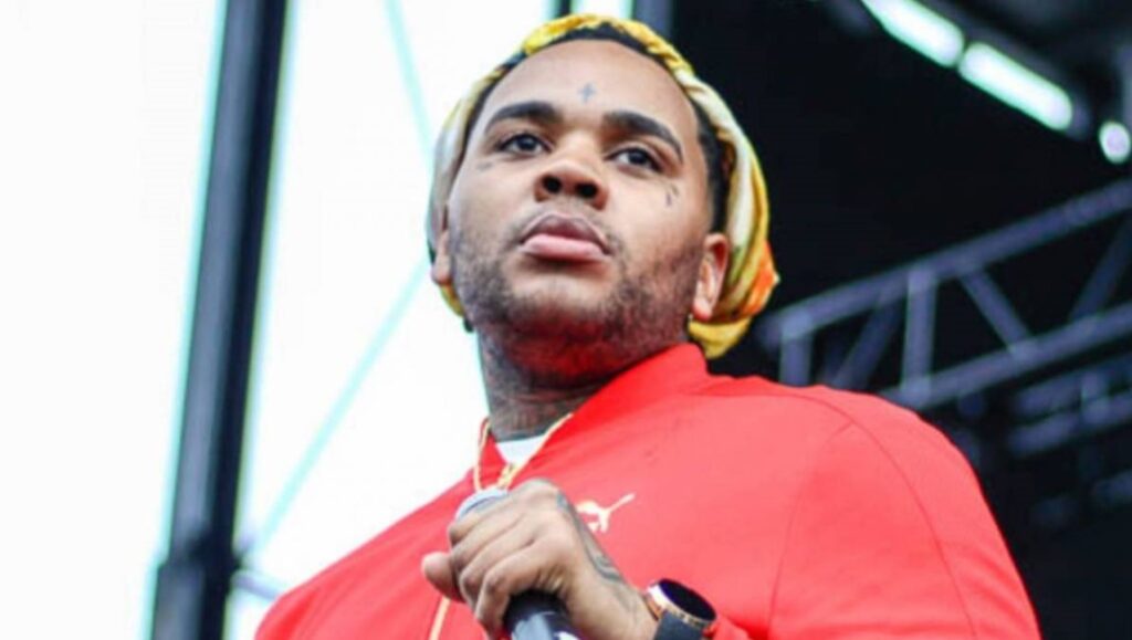Kevin Gates — Khaza Kevin Gates, June 2022 album roundup. Rapper with headscarf and red jacket holding a microphone. New music.