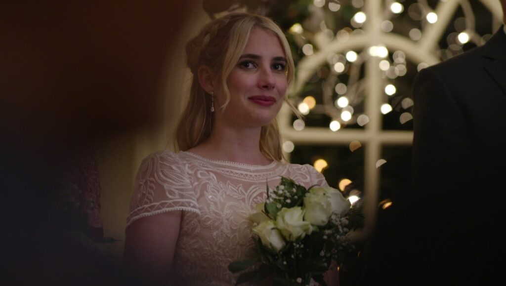 Before We Vanish — September 2022: About Fate, Four Winters, Dio: Dreamers Never Die Emma Roberts in About Fate movie. Blonde woman in wedding dress holding bouquet. Romantic comedy film.