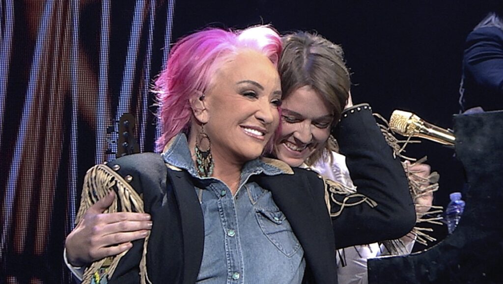 Tanya Tucker at DOC NYC 2022. The Return of Tanya Tucker documentary film. Pink hair, denim shirt, fringe jacket.