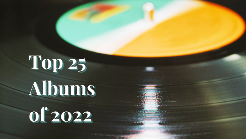 Top 25 Albums of 2022. Vinyl record spinning, music album cover art.