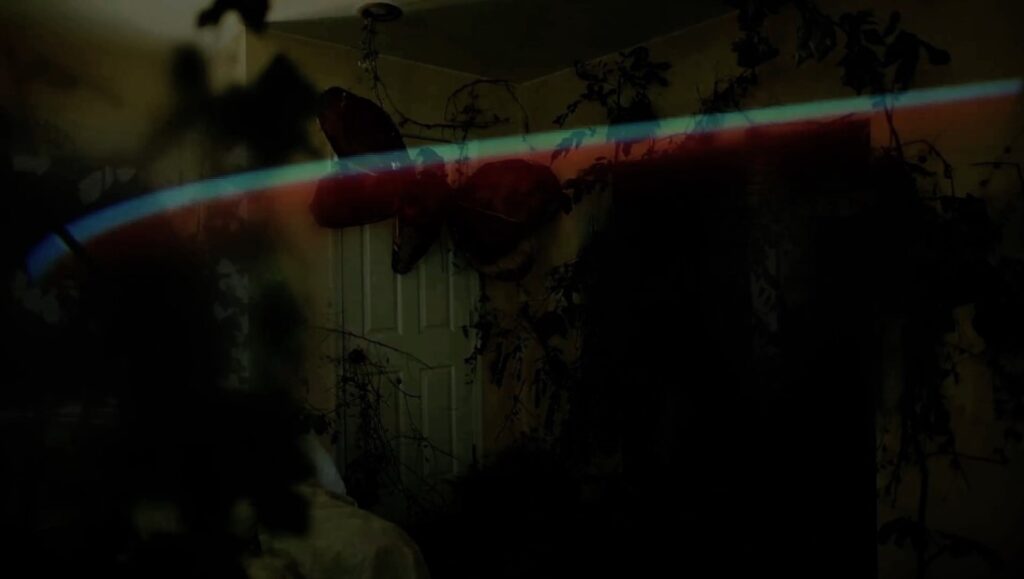 Landlocked — Paul Owens Landlocked by Paul Owens: Dark, moody interior with floral wallpaper and a rainbow light effect. Dark Sky Pictures.