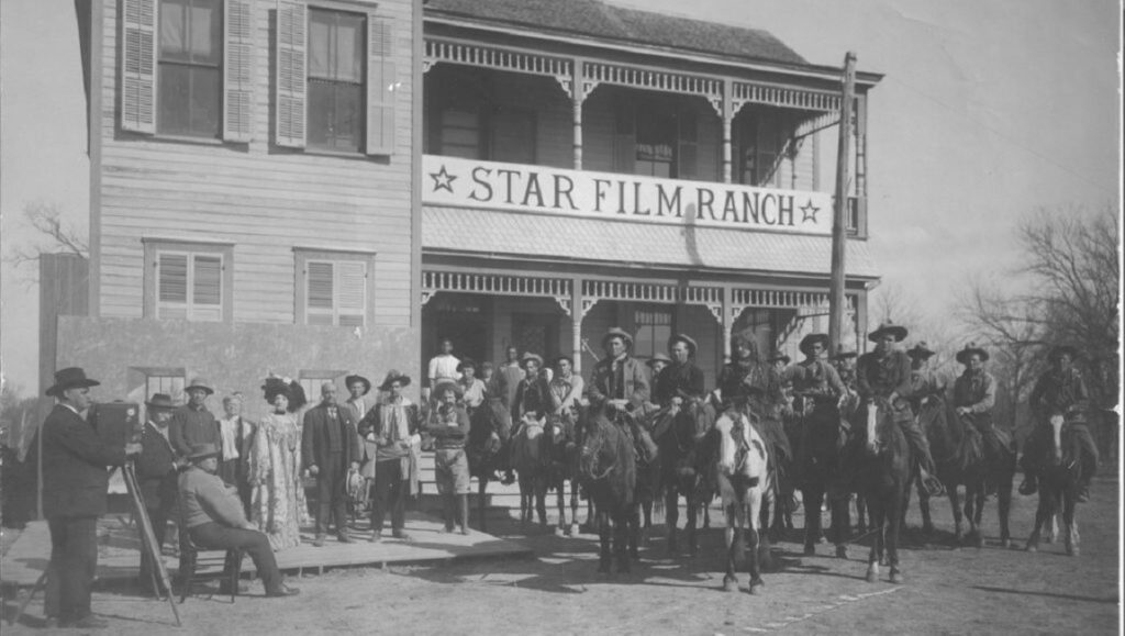 Cowboy Boots of Padre Park: A Quick History of Star Film Ranch Vintage photo of Star Film Ranch. Cowboys on horseback, actors, and a cameraman outside the film studio. Western movie set.
