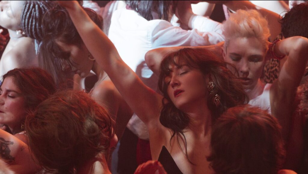 Beast in the Jungle film scene. People dancing in a crowded club. Aurora Films production.