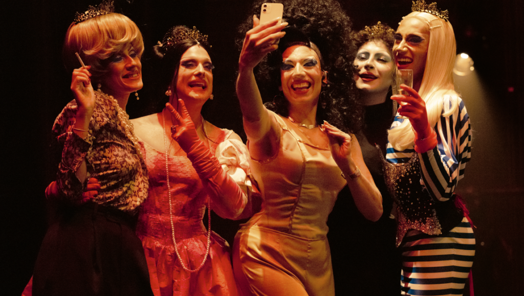 Three Nights a Week — Florent Gouëlou Group of drag queens taking a selfie. Three Nights a Week film promotional image.