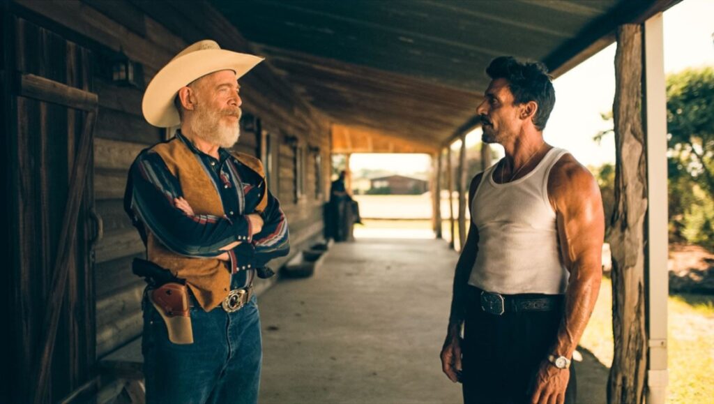 One Day as a Lion — John Swab One Day as a Lion movie scene. Frank Grillo and J.K. Simmons on a porch. Cowboy hat, tank top.