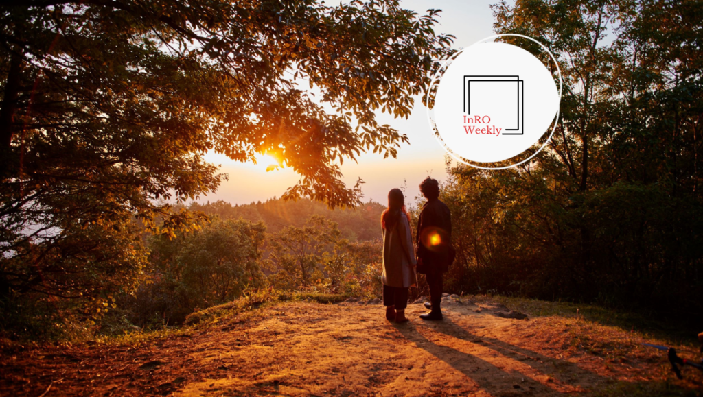 InRO Weekly magazine cover. Couple watching sunset. Nature, trees, and golden hour.