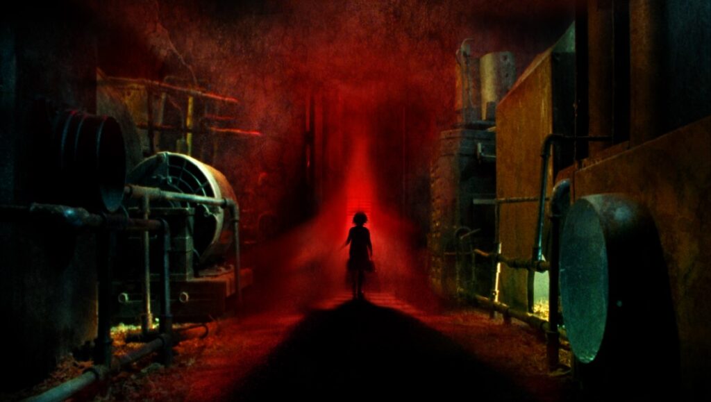 Moon Garden — Ryan Stevens Harris Moon Garden film still. Child silhouette stands in a dark, industrial corridor illuminated by red light.