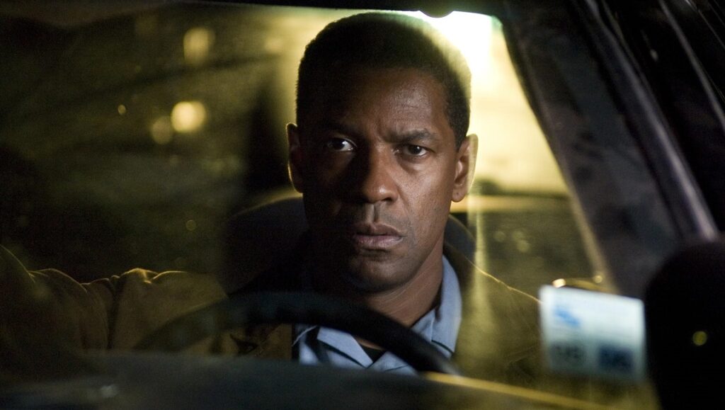 Déjà vu — Tony Scott Denzel Washington in Deja Vu. Actor driving a car, looking focused. Crime thriller movie scene.
