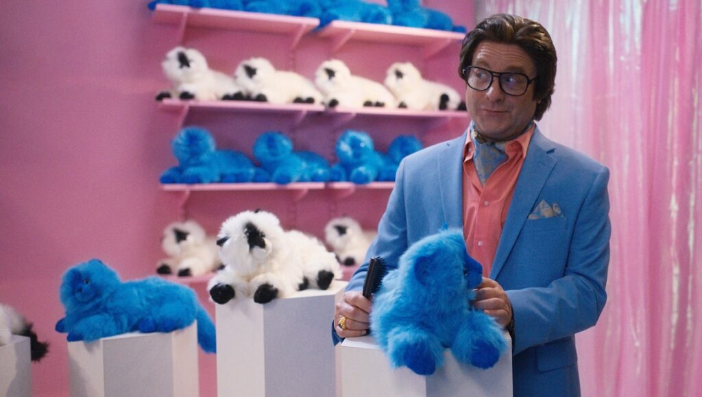 Zach Galifianakis in The Beanie Bubble movie with Beanie Babies. Collectible plush toys.