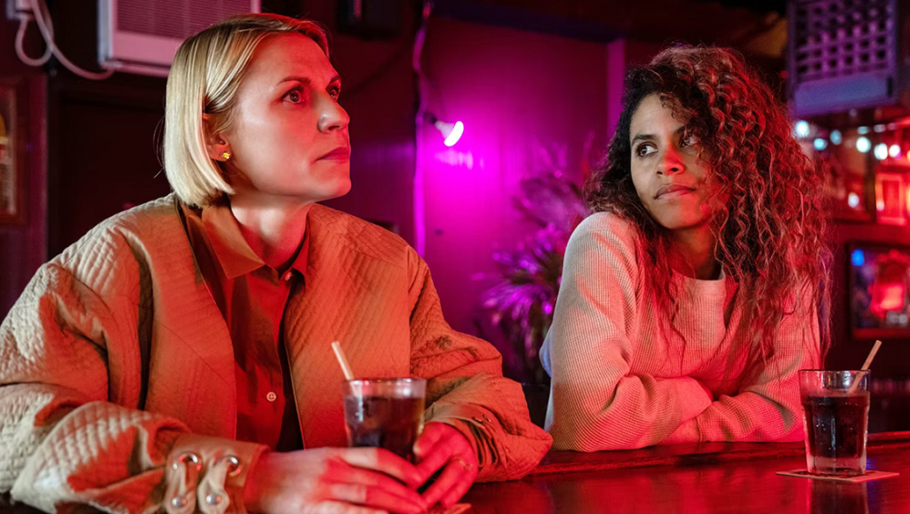 Claire Danes and Zazie Beetz in Full Circle, a Soderbergh series. Two women sit at a bar with drinks.