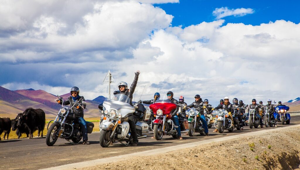 Redemption With Life film still from New York Asian Film Festival 2023. Motorcyclists on a road.