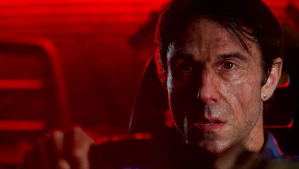 Fantasia Fest: Actor in Blackout movie. Man driving in red light. Thriller film.