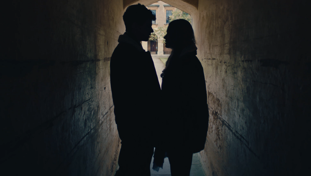 Silhouette of a couple at Oxford University. Surprised by Oxford movie still.