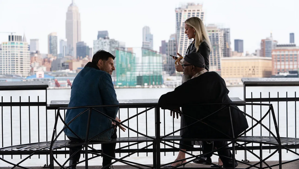 The Kill Room — Nicol Paone The Kill Room movie scene: Uma Thurman, Samuel L. Jackson, Joe Manganiello on a bench with a city view.