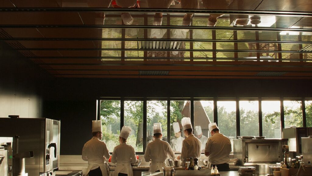 TIFF 2023 — Dispatch 3: Menus-Plaisirs: Les Troisgros, The Holdovers, In the Rearview Chefs in Menus-Plaisirs Les Troisgros at NYFF 2023. Culinary artistry in a restaurant kitchen.