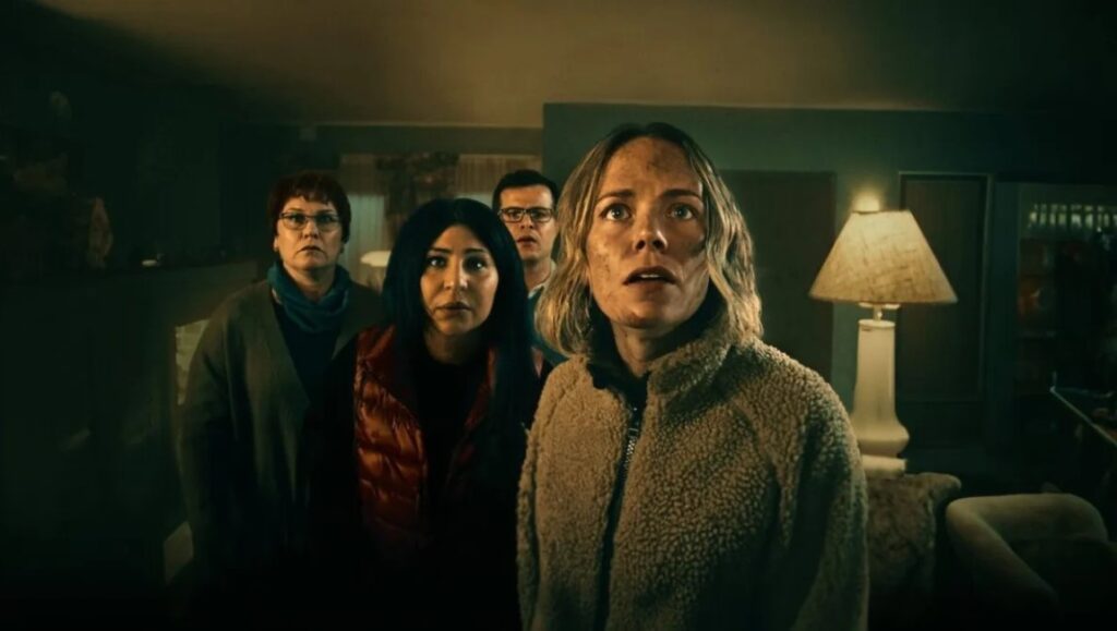 The Conference — Patrik Eklund Cast of The Conference movie on Netflix looking shocked. Horror comedy film.