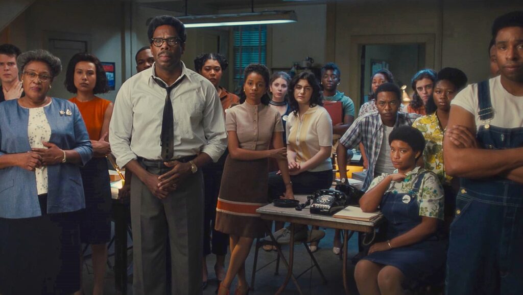 Rustin film scene: Civil rights activists in an office. George C. Wolfe directs.