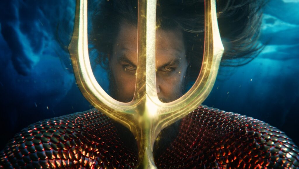 Aquaman (Jason Momoa) with trident in Aquaman and the Lost Kingdom, directed by James Wan.
