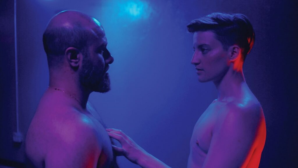 Desire Lines still: Aden Hakimi and Theo Germaine face each other in a scene from the Jules Rosskam film.