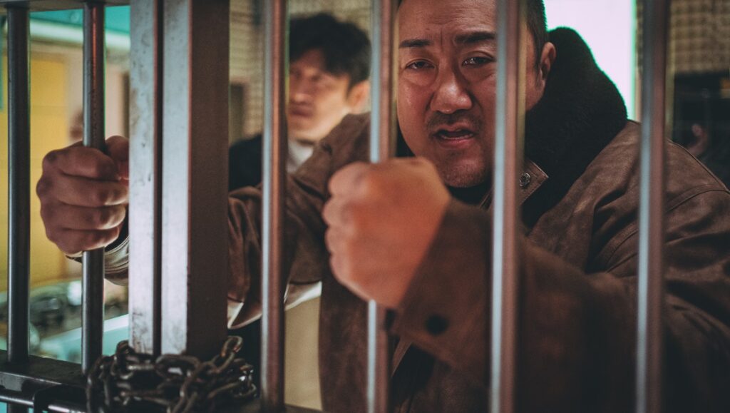 Ma Dong-seok in The Roundup: Punishment behind bars. Korean action film review.