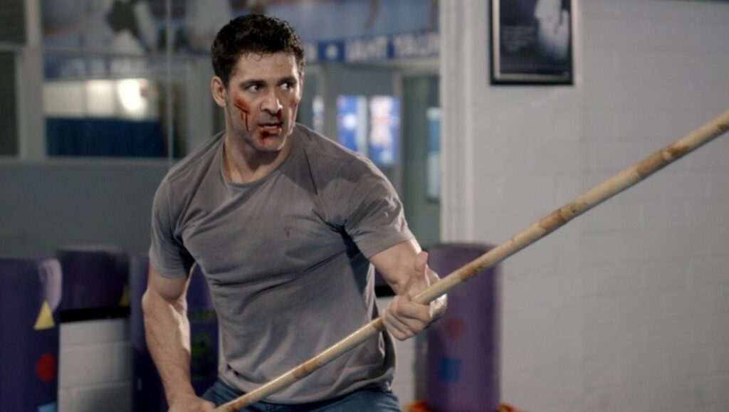 Bren Foster in Life After Fighting movie review. Wounded fighter with a bo staff. Action film.