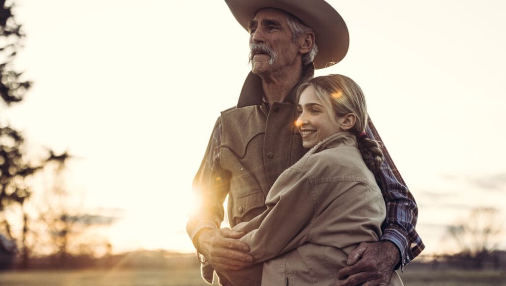 Ride movie image: Cowboy embraces a young girl. Western film scene with Jake Allyn.