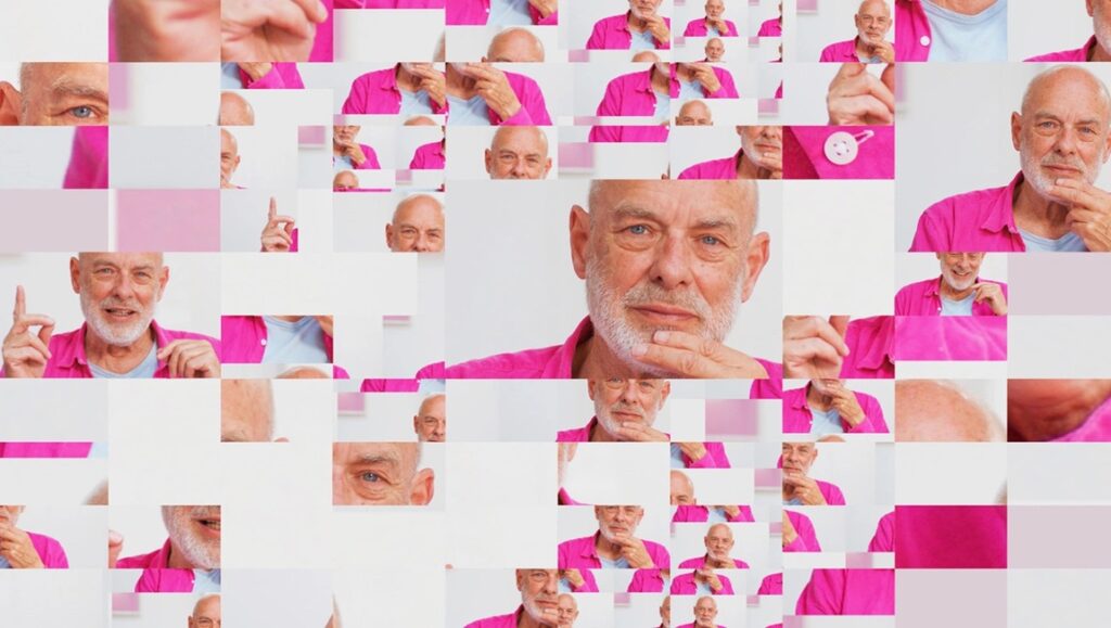 Eno film review: Gary Hustwit's documentary features a mosaic of Brian Eno. Pink shirt, white beard, and thoughtful poses.