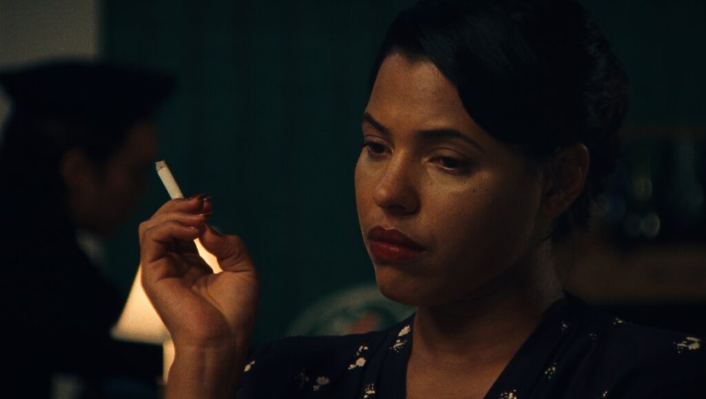 Suzanne Cesaire in The Ballad of Suzanne Cesaire at FIDMarseille '24, holding a cigarette.