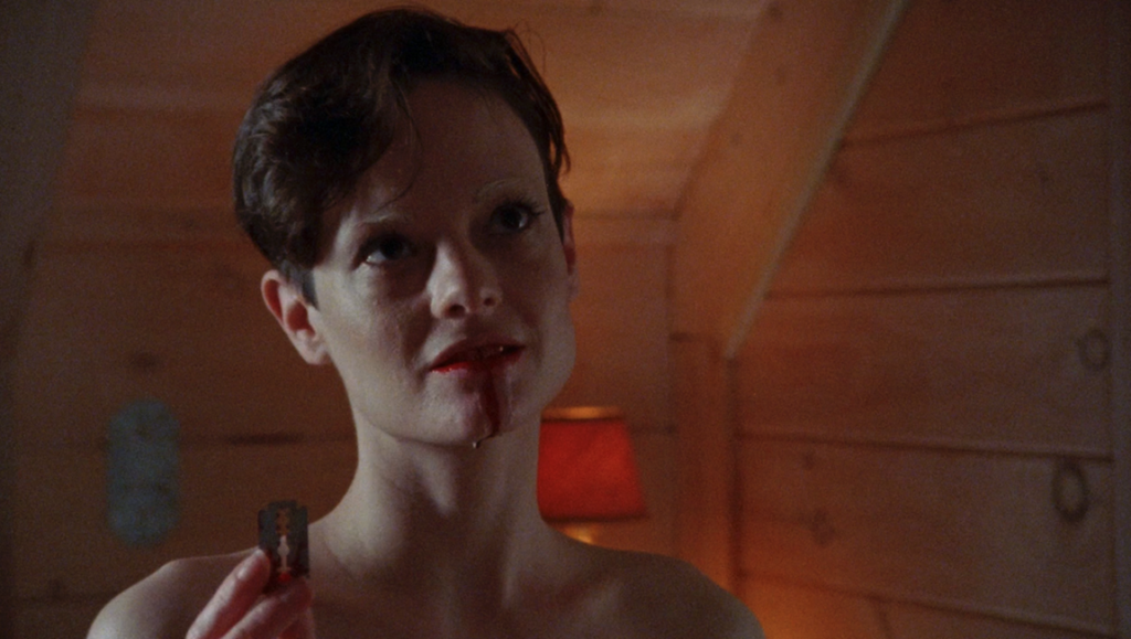 Black Eyed Susan film still: Woman with blood, holding a razor. Fantasia Fest 2024. Horror film.