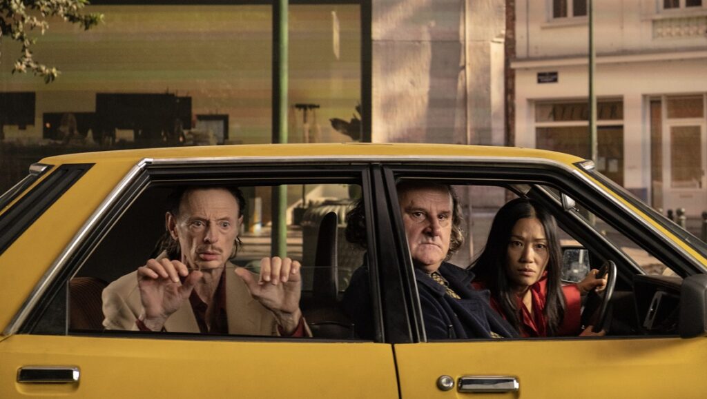 The Falling Star movie scene: Abel & Gordon in a yellow car with a woman driving. Review of the film.