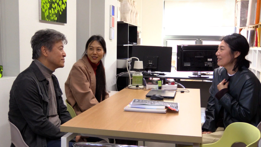A Hundred Thousand Billion film review: Actors at table, discussing the film.