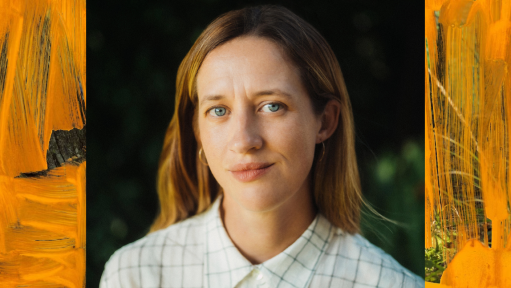 India Donaldson portrait. Filmmaker with blonde hair, blue eyes, in an interview setting. Indie film director.