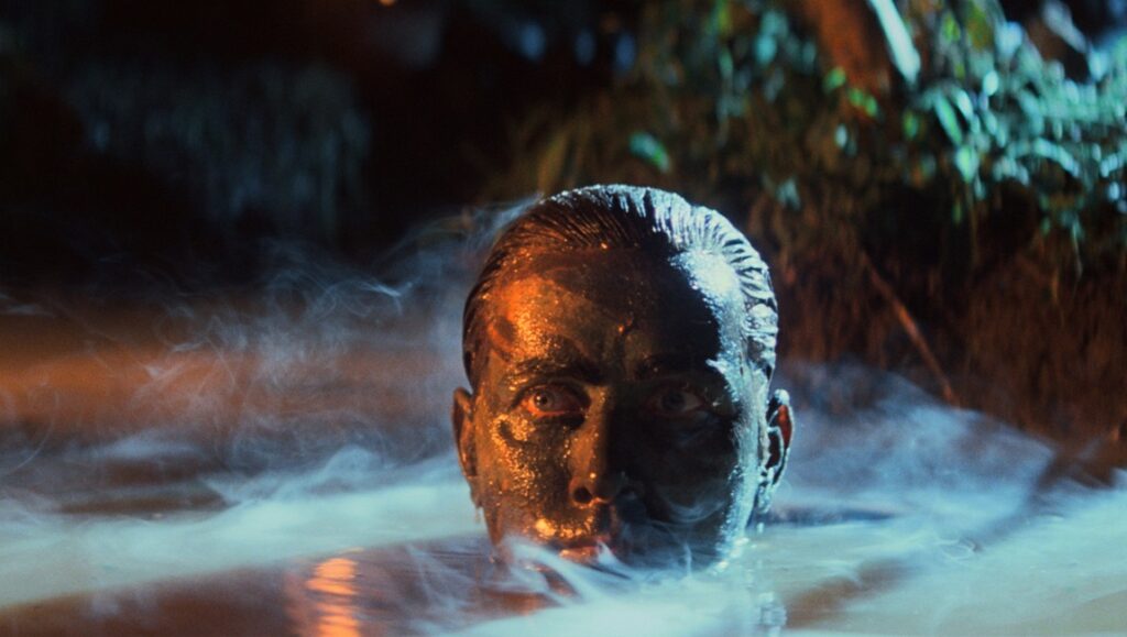 Apocalypse Now — Francis Ford Coppola Apocalypse Now: Martin Sheen emerges from water. Francis Ford Coppola film.