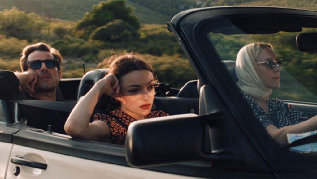 Film still from Bonjour Tristesse. Three people in a convertible car. Road trip. Summer.