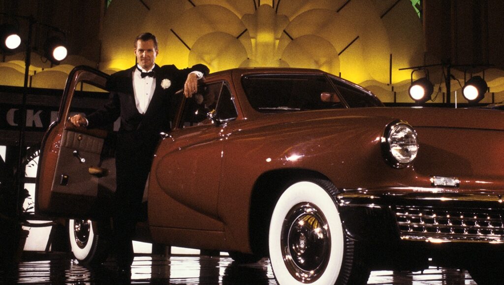 Francis Ford Coppola's Gardens of Stone film still: James Caan with a classic Tucker automobile.