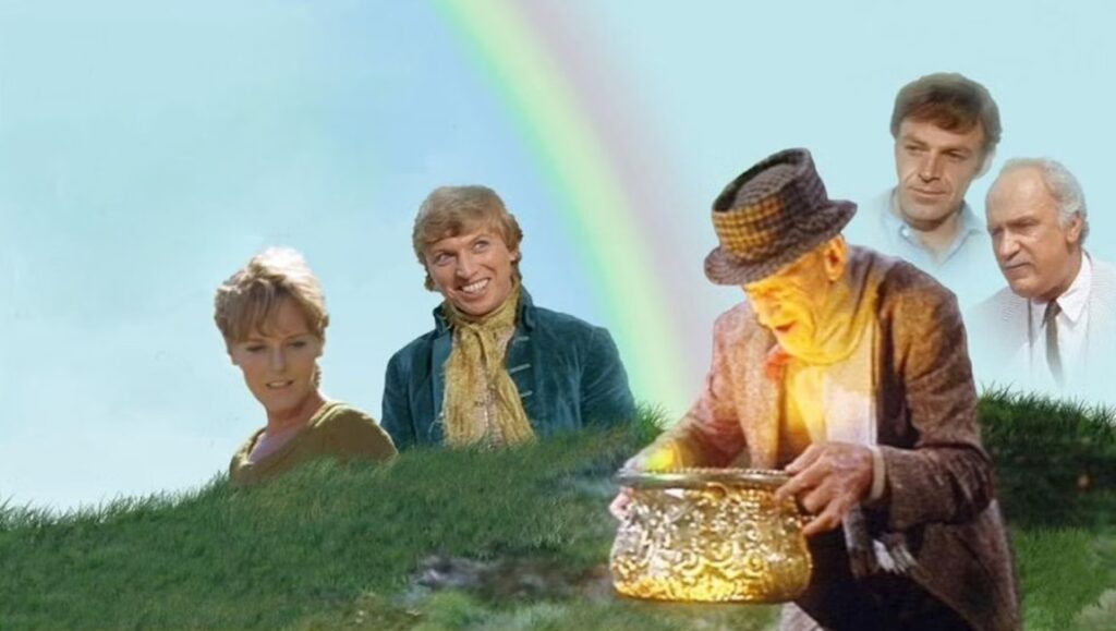 Finian's Rainbow film still. Cast members with pot of gold and rainbow.