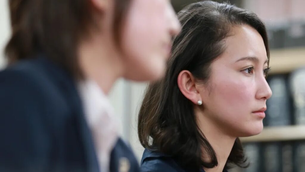 Shiori Itō in Black Box Diaries documentary film. Close-up of Shiori Itō in profile.