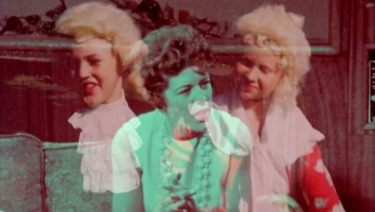 Film still from The Gloria of your Imagination, Jennifer Reeves. Women in vintage dresses with layered, colorful effects.