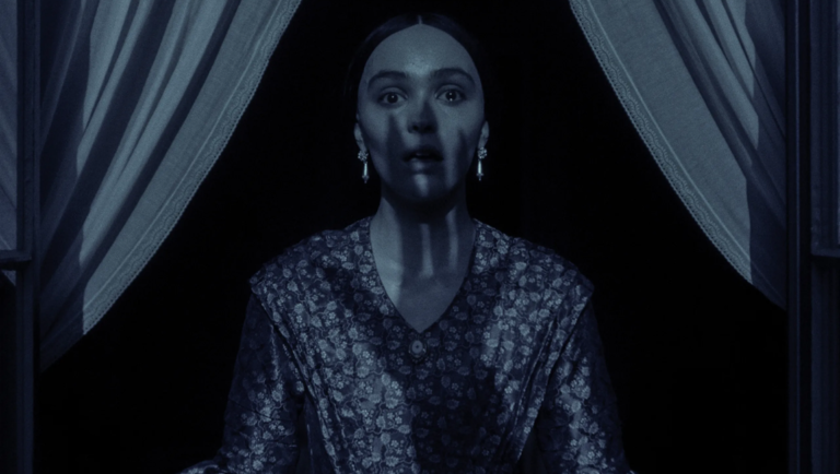 Anya Taylor-Joy in *Nosferatu* (2024). Shadow of Count Orlok on her face, horror movie scene. Robert Eggers film.