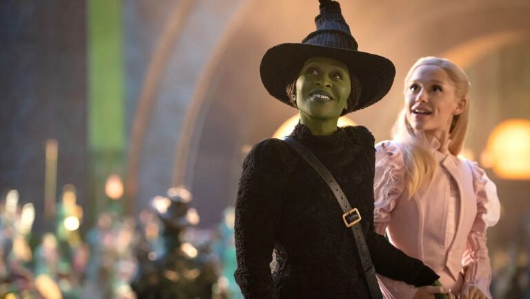 Wicked Part One movie still. Cynthia Erivo as Elphaba, the Wicked Witch, and Ariana Grande as Glinda.