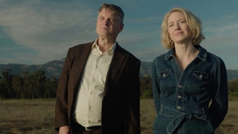 Lake George review image: Actors looking up in a field. Jeffrey Reiner directs.