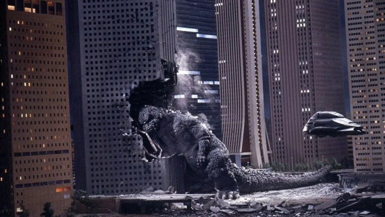 Godzilla destroys a skyscraper in The Return of Godzilla, directed by Kôji Hashimoto. Sci-fi movie scene.
