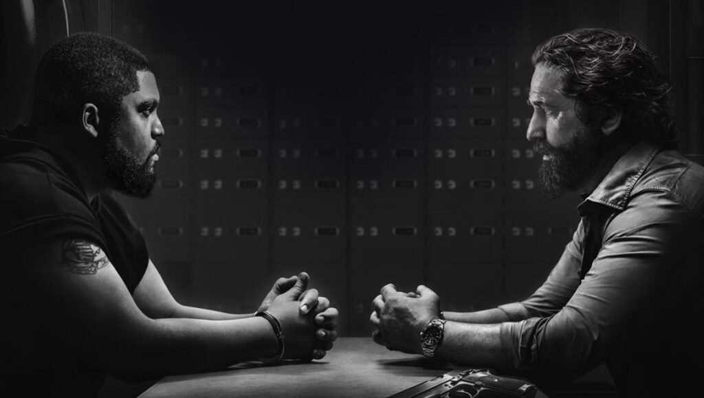 January 2025 — Reviews Roundup Den of Thieves movie scene. Gerard Butler and O'Shea Jackson Jr. face off in an intense interrogation. January 2025 film review.