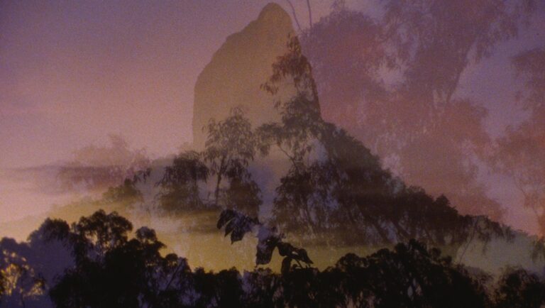 Dreamy landscape with a mountain silhouette and trees. Bunya mountain scenery, nature photography.