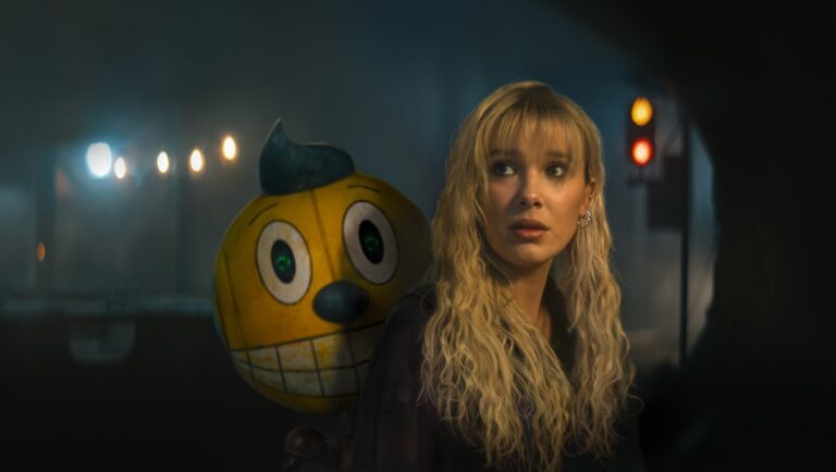 Millie Bobby Brown in The Electric State with a yellow robot companion. Russo brothers film review.
