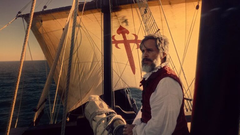 Magellan on a ship. Historical nautical exploration scene with a bearded man on a sailing vessel with a sword cross emblem.
