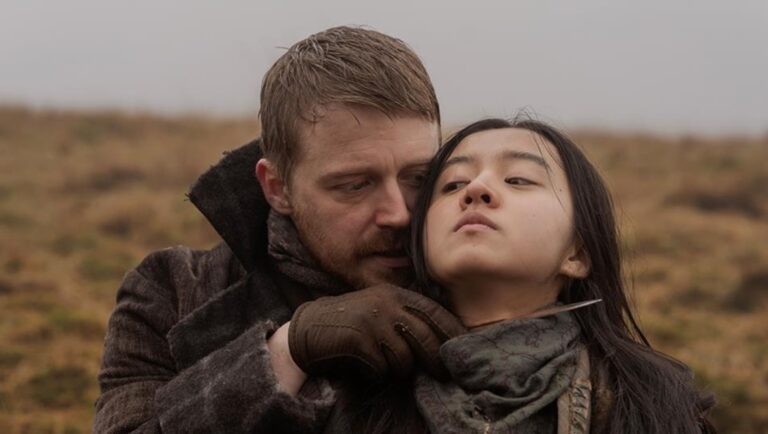 Tornado movie scene: Man holds knife to woman's throat. Drama, suspense.